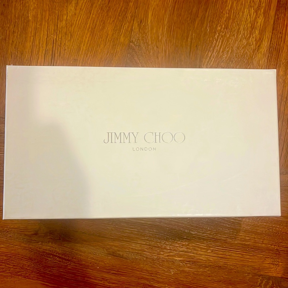 Used - like new. Size 7.5 Woman’s. Jimmy Choo ballet flats.